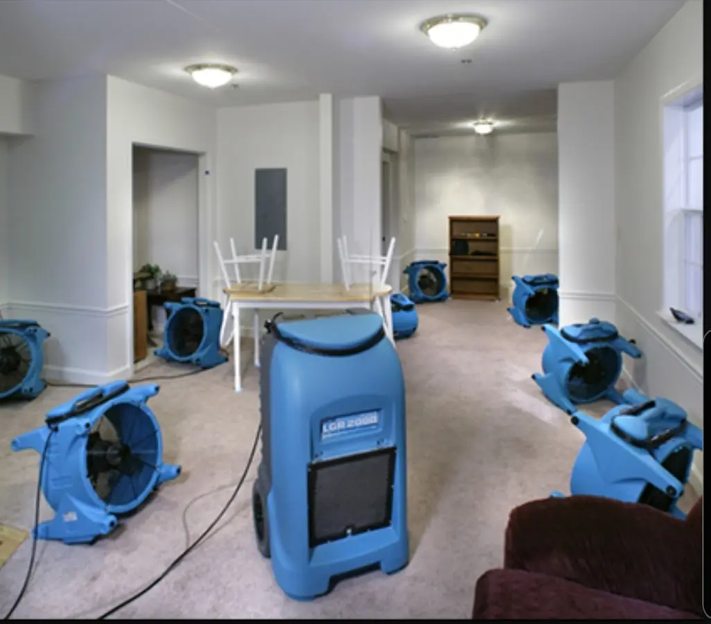 Air movers and dehumidifier setup for Water Damage Restoration in Carpentersville